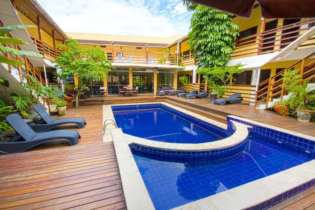 Flat Vila Morena A Pousada Da Sua Familia Camburi  Esterno foto